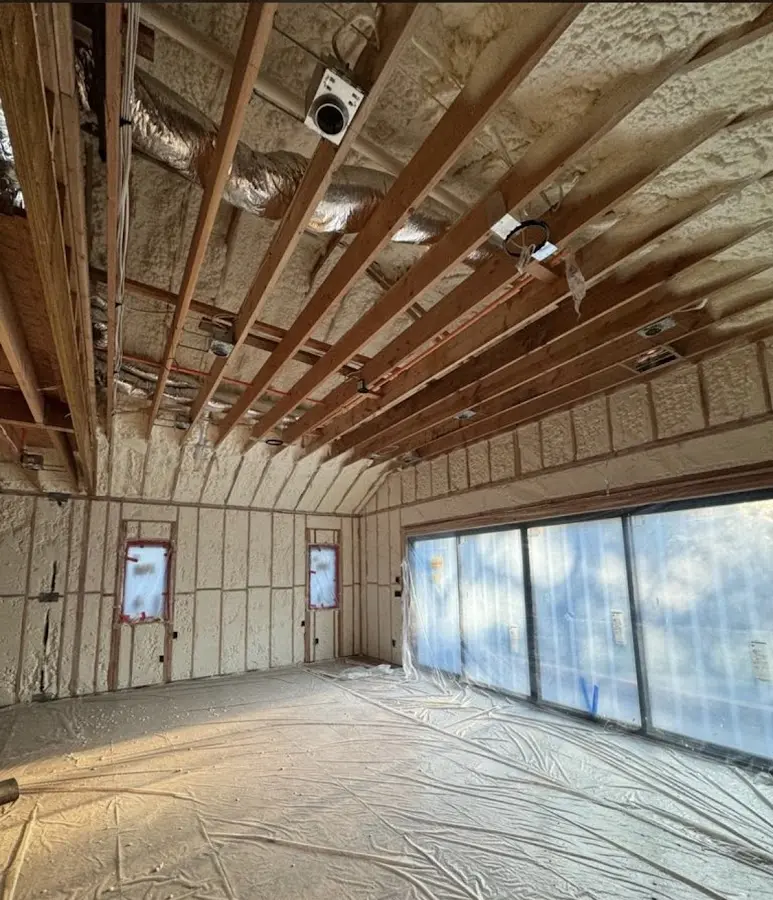 Interior walls and ceiling insulated with spray foam during new construction in North Olmsted